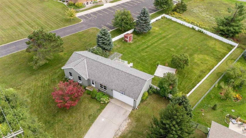 Charming 3-bedroom, 2-bath ranch on nearly half an acre, just a - Beach Home for sale in Petoskey, Michigan on Beachhouse.com