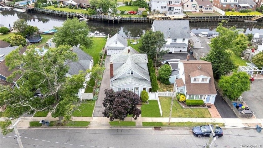 Waterfront Property Located On A Wide Canal. The Ideal Blend Of - Beach Home for sale in Baldwin, New York on Beachhouse.com