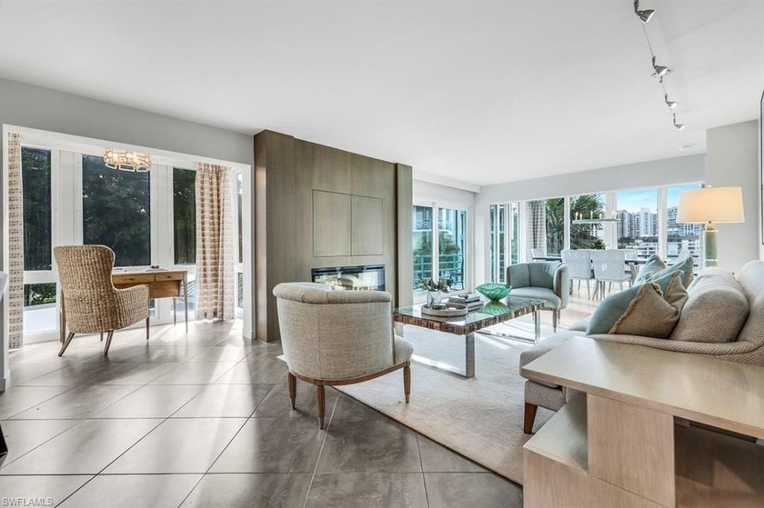 Sweeping long Bay Views and upscale design mark this end unit as - Beach Home for sale in Naples, Florida on Beachhouse.com