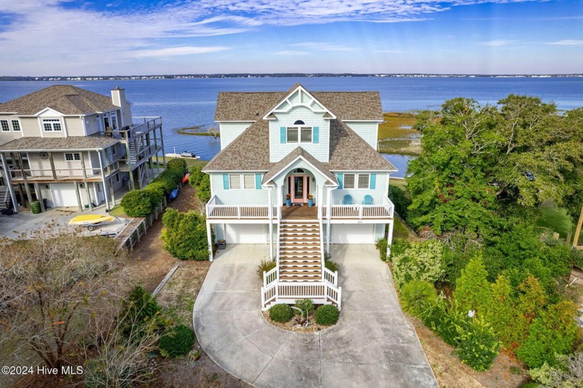 This beautiful home delivers the ultimate waterfront lifestyle - Beach Home for sale in Emerald Isle, North Carolina on Beachhouse.com