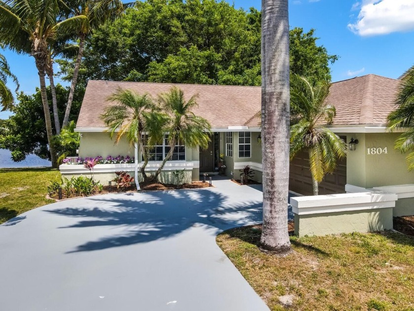 This stunning 3-bedroom, 2-bathroom single-family home offers - Beach Home for sale in Boynton Beach, Florida on Beachhouse.com