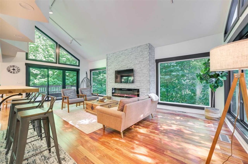 An updated Birchwood home is offered fully furnished and ready - Beach Home for sale in Harbor Springs, Michigan on Beachhouse.com