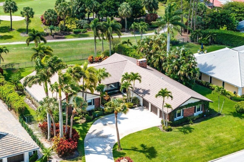 This thoughtfully cared for home offers 3 spacious bedrooms - Beach Home for sale in Atlantis, Florida on Beachhouse.com