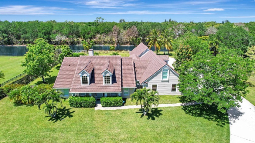 Welcome to this beautiful oasis nestled on over 1 acre of land - Beach Home for sale in Wellington, Florida on Beachhouse.com