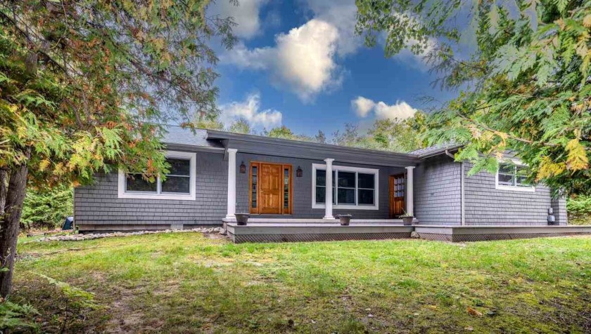 $150,000 REDUCTION ON THIS AWESOME BOULDER PARK HOME!  Inviting - Beach Home for sale in Charlevoix, Michigan on Beachhouse.com