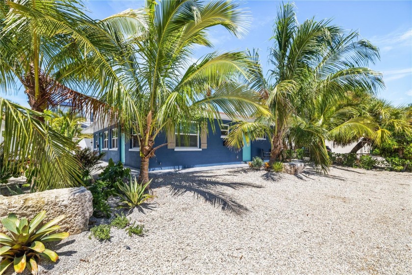 West of Gulf, this luxury duplex home is walking distance to the - Beach Home for sale in Holmes Beach, Florida on Beachhouse.com