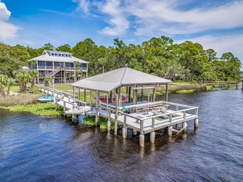 Welcome home to 42 River Drive - a unique, secluded home that - Beach Home for sale in Panacea, Florida on Beachhouse.com