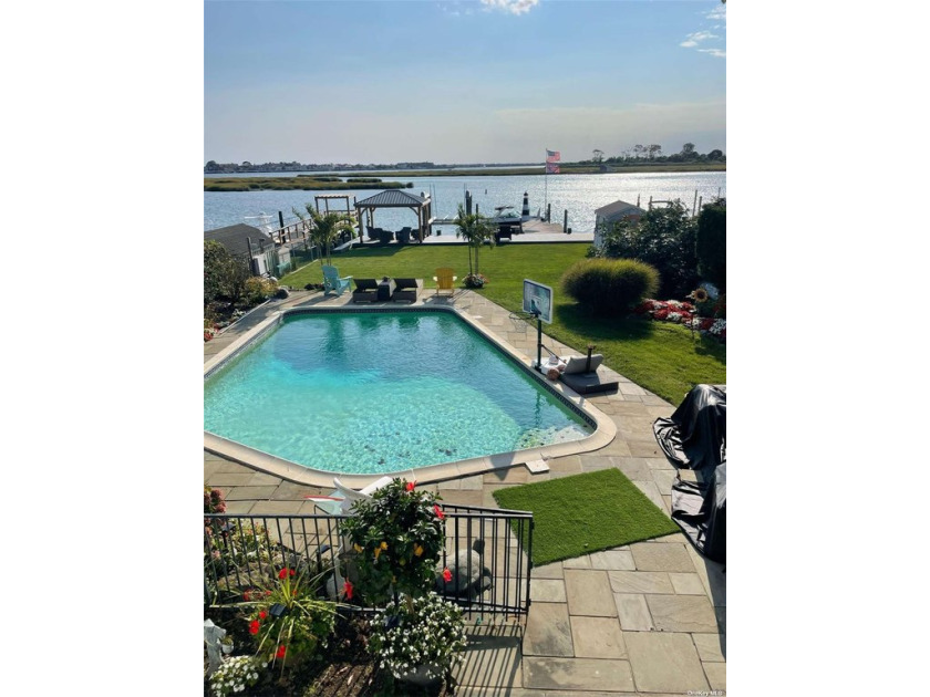 Magnificent Open Bay Waterfront Custom Built Home. 10 ft - Beach Home for sale in Island Park, New York on Beachhouse.com