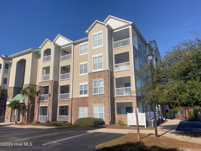 Welcome to your new almost beachside paradise! This charming - Beach Condo for sale in Surf City, North Carolina on Beachhouse.com