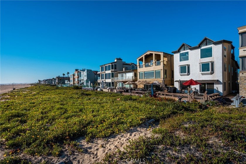 This beach front duplex offers a stunning ocean view, allowing - Beach Townhome/Townhouse for sale in Sunset Beach, California on Beachhouse.com