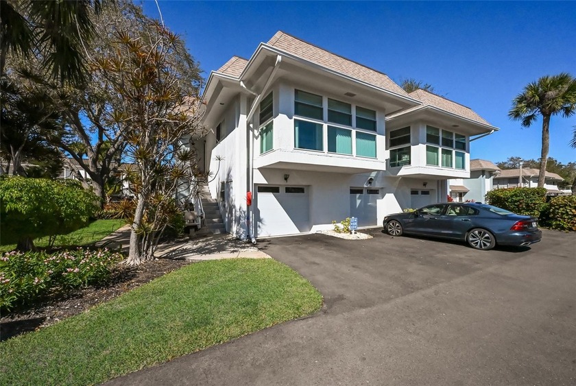 Welcome home to Sutton Place on Longboat Key, a pet friendly - Beach Townhome/Townhouse for sale in Longboat Key, Florida on Beachhouse.com