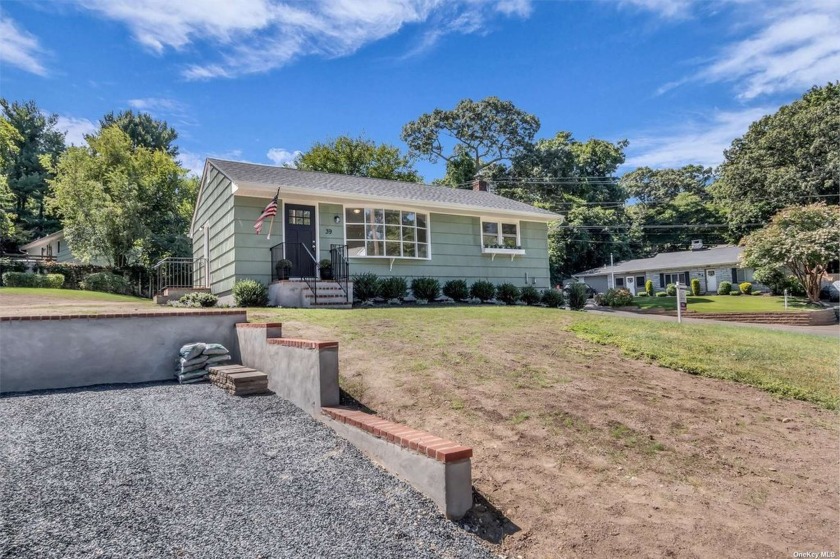 Welcome to this beautifully renovated 3-bedroom, 1-bathroom - Beach Home for sale in Rocky Point, New York on Beachhouse.com