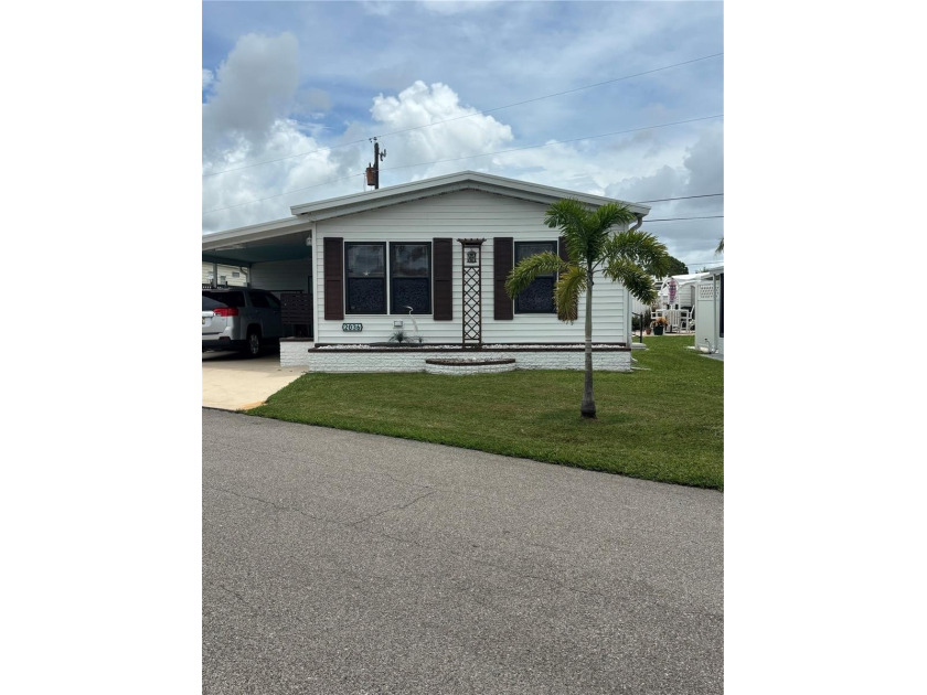 Enjoy Sarasota living in this beautifully maintained 2 Bedroom - Beach Home for sale in Sarasota, Florida on Beachhouse.com