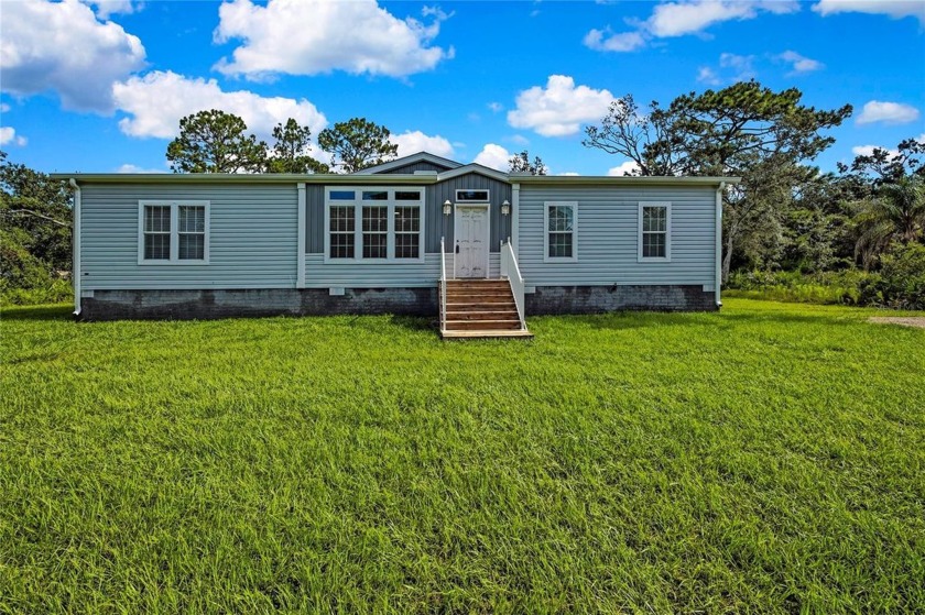 Welcome to this stunning like-new 2024-built home nestled on a - Beach Home for sale in Homosassa, Florida on Beachhouse.com