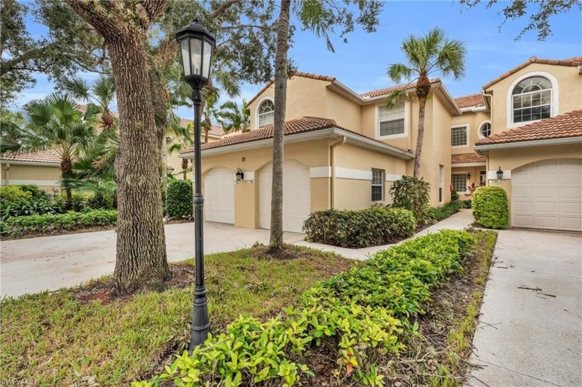 This beautifully updated coach home, complete with an attached - Beach Townhome/Townhouse for sale in Naples, Florida on Beachhouse.com