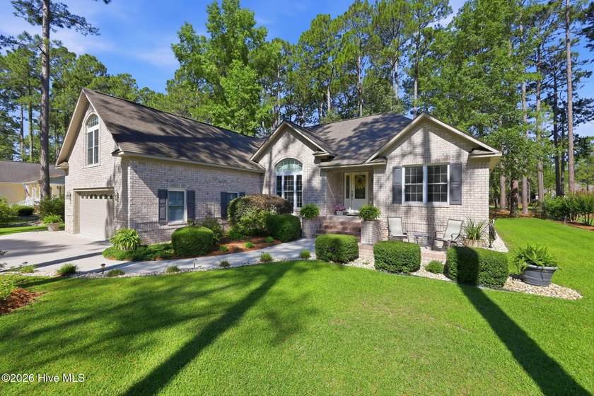 Nestled on a beautifully landscaped homesite overlooking the - Beach Home for sale in New Bern, North Carolina on Beachhouse.com