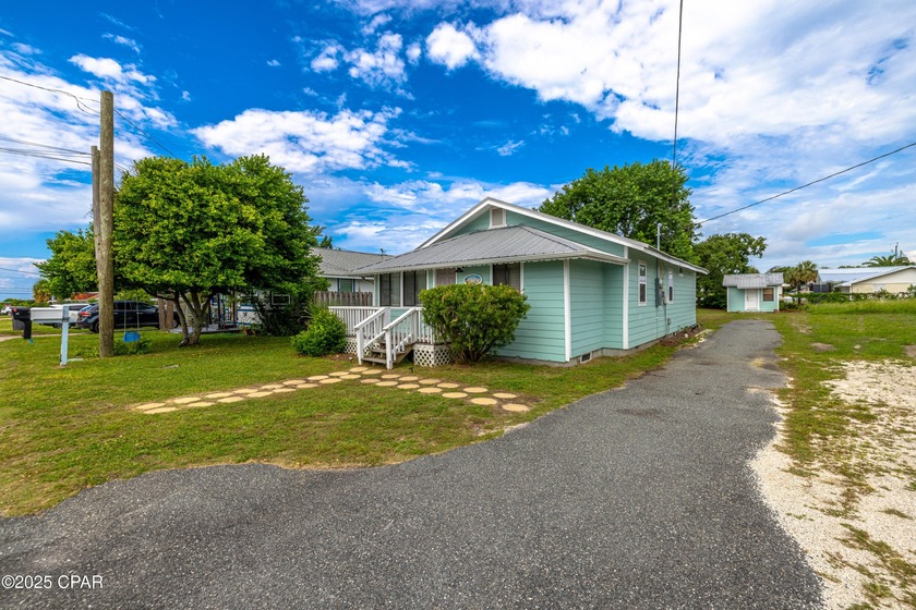 Laguna Beach living at its finest! This 4 bedroom, 2 bath - Beach Home for sale in Panama City Beach, Florida on Beachhouse.com
