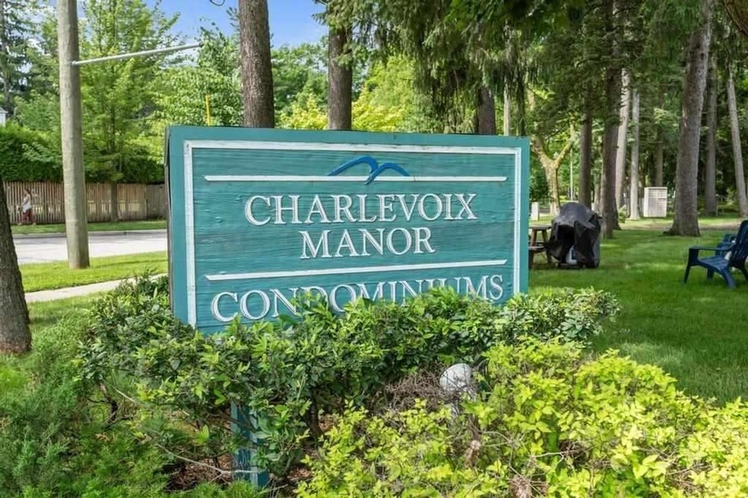 Perfectly situated on Charlevoix's north side at the corner of - Beach Home for sale in Charlevoix, Michigan on Beachhouse.com