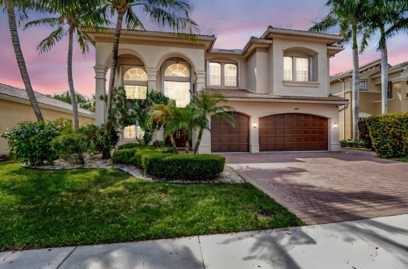 Nestled on a serene cul-de-sac in the prestigious Canyon Springs - Beach Home for sale in Boynton Beach, Florida on Beachhouse.com