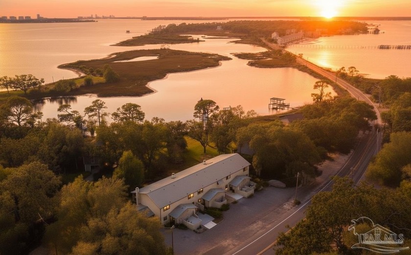 ULTIMATE COASTAL LIFESTYLE IN THIS COZY WATERFRONT TOWNHOME ON - Beach Home for sale in Pensacola, Florida on Beachhouse.com