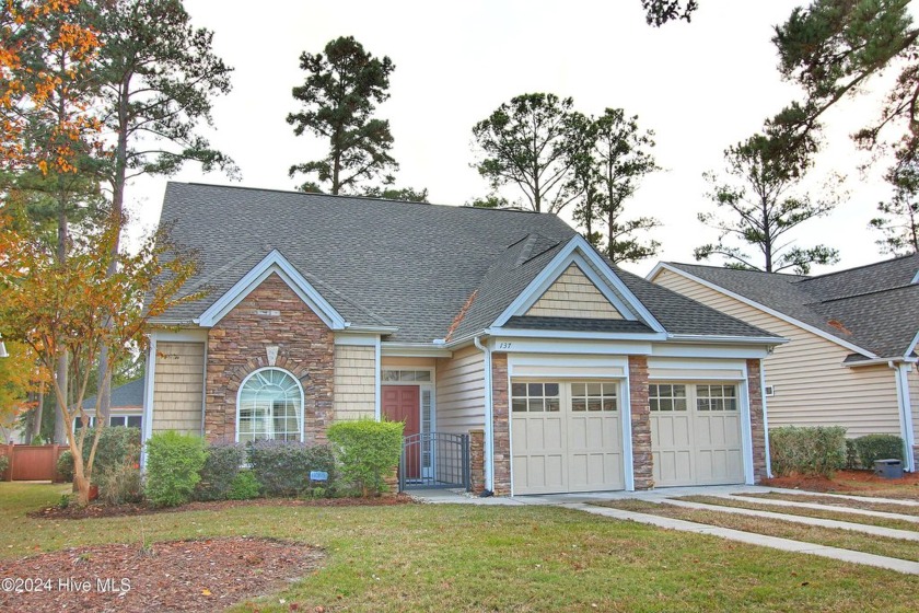 Welcome to your dream home in Cobblestone Village, nestled in - Beach Home for sale in Sunset Beach, North Carolina on Beachhouse.com