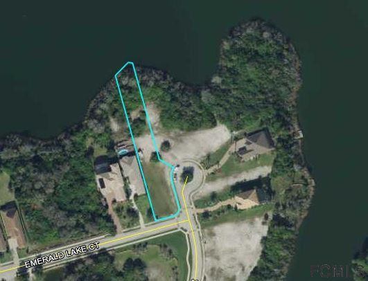 Beautiful large lot on the biggest lake in the gated community - Beach Lot for sale in Palm Coast, Florida on Beachhouse.com