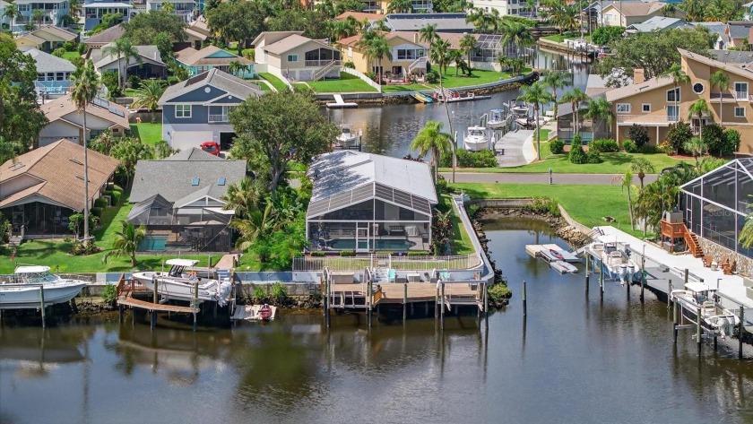 Live the Florida dream in this deep-water canal front home with - Beach Home for sale in New Port Richey, Florida on Beachhouse.com
