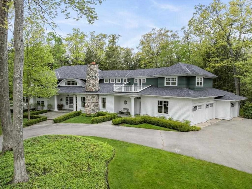 Nestled privately on nearly two wooded acres in the heart of - Beach Home for sale in Harbor Springs, Michigan on Beachhouse.com