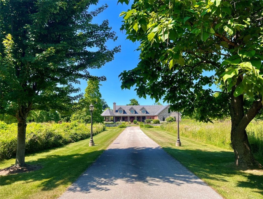 Overlooking Lake Erie in Harborcreek, this 12+ acre estate is a - Beach Home for sale in North East, Pennsylvania on Beachhouse.com