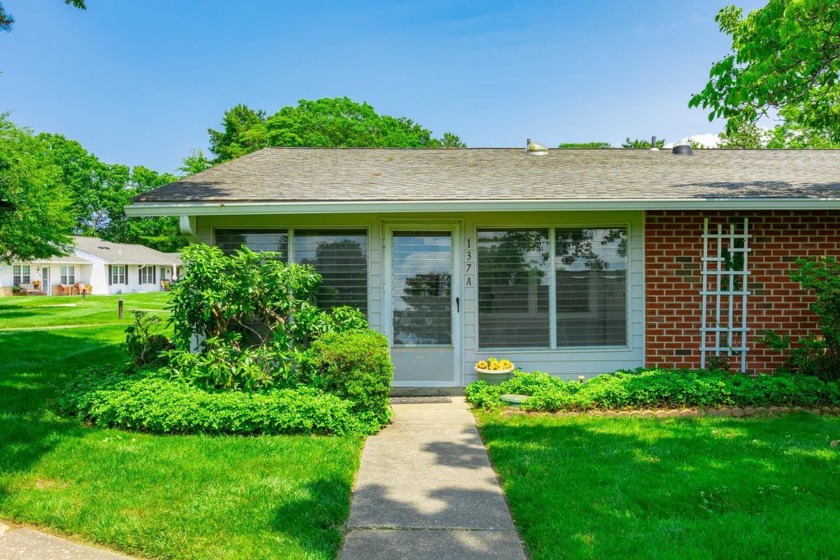 Welcome to this rare and beautiful 2 bed, 1 bath end unit in the - Beach Condo for sale in Ridge, New York on Beachhouse.com
