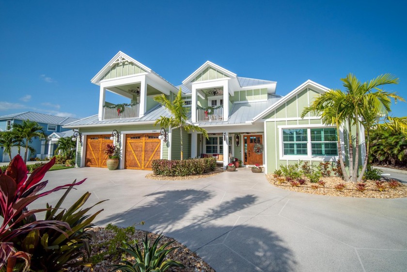 This waterfront property spans over one acre and showcases a - Beach Home for sale in Port Saint Lucie, Florida on Beachhouse.com