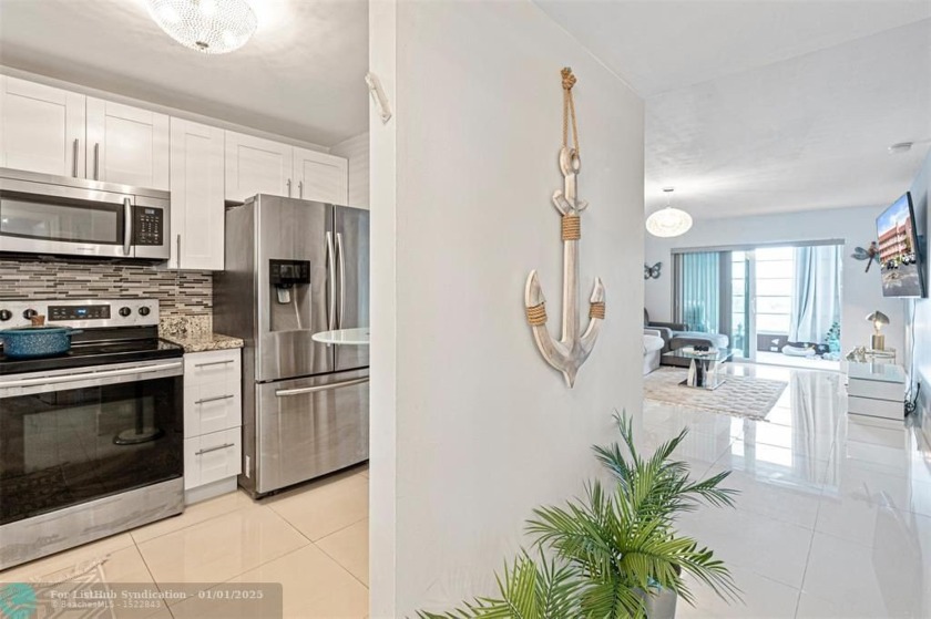 Step into this beautifully remodeled lakefront residence! This - Beach Condo for sale in Sunrise, Florida on Beachhouse.com