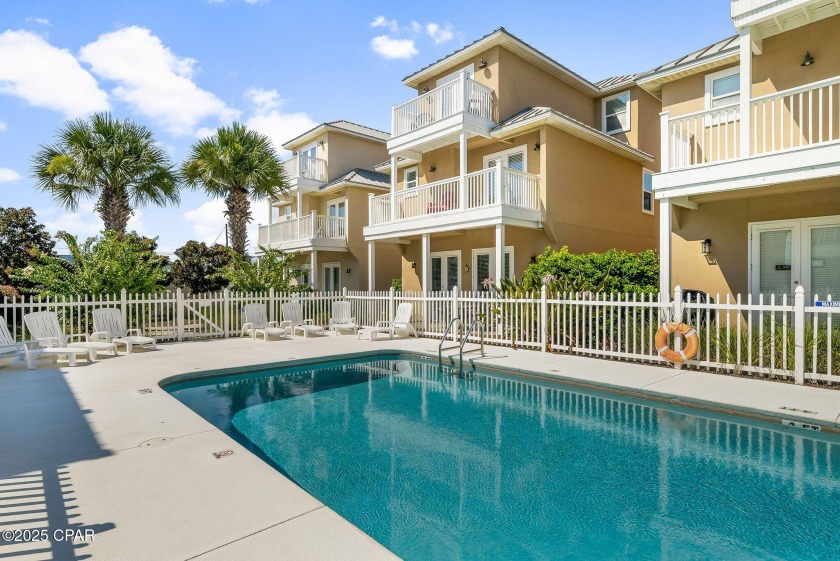 Just steps from the sugar-white sands of Panama City Beach, this - Beach Home for sale in Panama City, Florida on Beachhouse.com