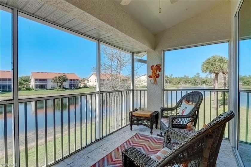 Lake and fountain views await you from this 2nd floor, end-unit - Beach Condo for sale in Naples, Florida on Beachhouse.com