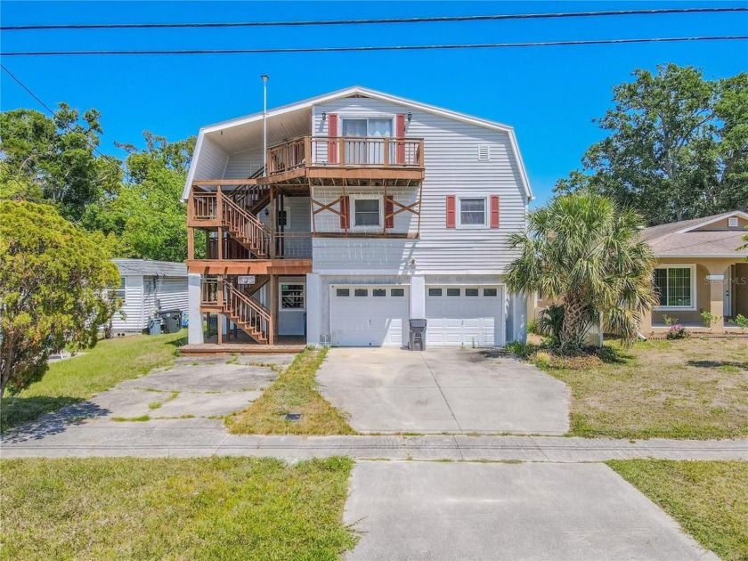 OPPORTUNITY KNOCKS In this POTENTIAL-FILLED 4 BEDROOM 2.5 BATH- - Beach Home for sale in Oldsmar, Florida on Beachhouse.com