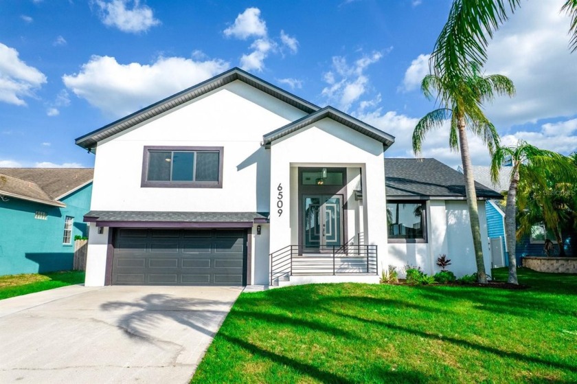 Welcome to 6509 Dolphin Cove Drive, Apollo Beach--a fully - Beach Home for sale in Apollo Beach, Florida on Beachhouse.com