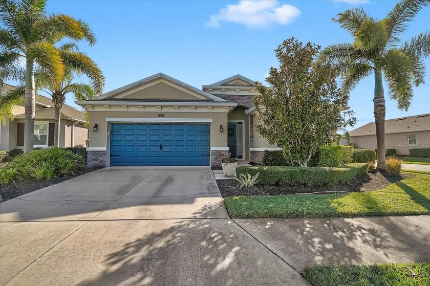 Located on a corner lot in The Fairways at Bent Tree, this home - Beach Home for sale in Sarasota, Florida on Beachhouse.com