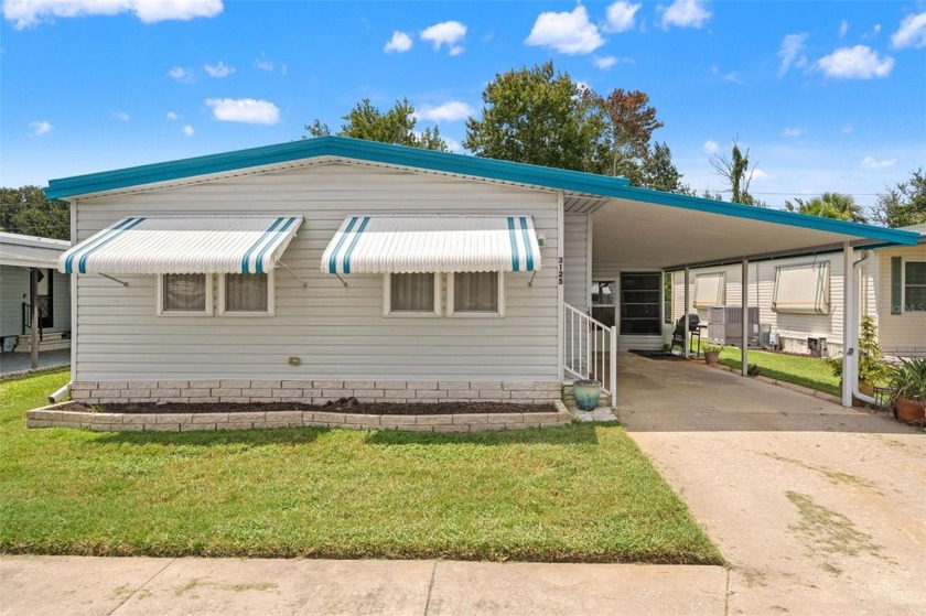 Stunning lakefront views at an attractive price! Welcome to 3125 - Beach Home for sale in Holiday, Florida on Beachhouse.com