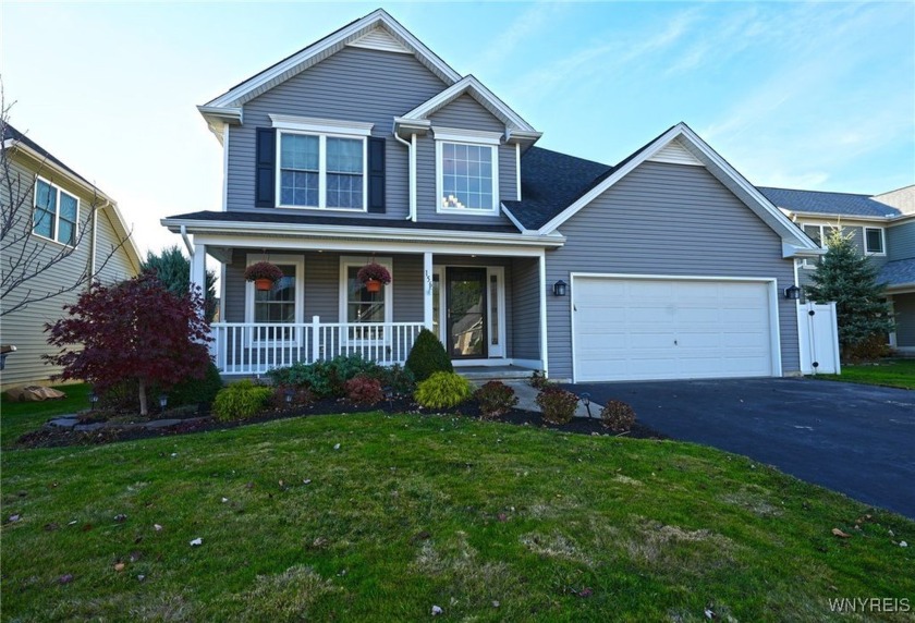 Welcome home to this bright  airy Marrano-built Colonial located - Beach Home for sale in Amherst, New York on Beachhouse.com