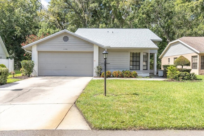 Back on the market with fresh paint and brand-new luxury vinyl - Beach Home for sale in New Port Richey, Florida on Beachhouse.com