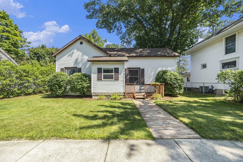 This charming Ludington home, just blocks from the stunning Lake - Beach Home for sale in Ludington, Michigan on Beachhouse.com