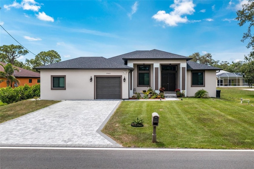 BUILT IN 2023 | MOTHER-IN-LAW SUITE | GOURMET KITCHEN | - Beach Home for sale in North Port, Florida on Beachhouse.com