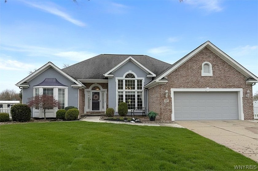 Welcome to this exceptional luxury ranch home, ideally situated - Beach Home for sale in Buffalo, New York on Beachhouse.com