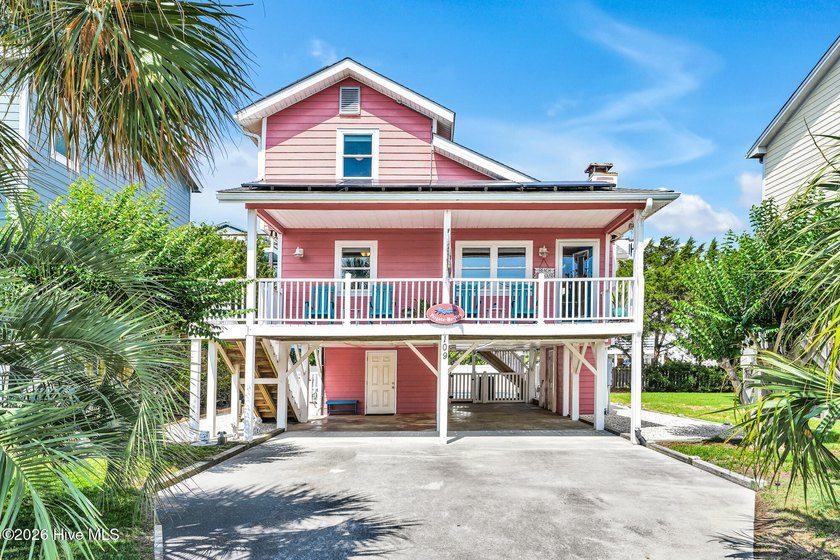 Experience the best of island living in this vibrant and - Beach Home for sale in Holden Beach, North Carolina on Beachhouse.com