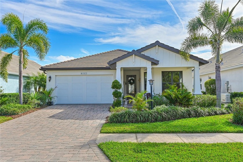 Welcome to this Craftsman style home in Lakehouse Cove where - Beach Home for sale in Sarasota, Florida on Beachhouse.com