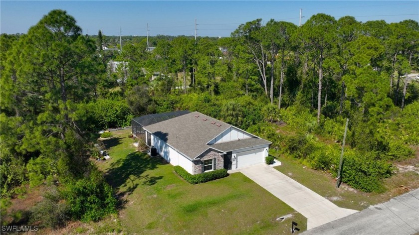 This beautiful, better than new home offers 3 bedrooms, 2 - Beach Home for sale in Lehigh Acres, Florida on Beachhouse.com