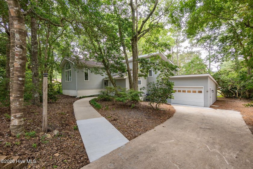 Waterfront living in Pine Knoll Shores. This partially renovated - Beach Home for sale in Pine Knoll Shores, North Carolina on Beachhouse.com