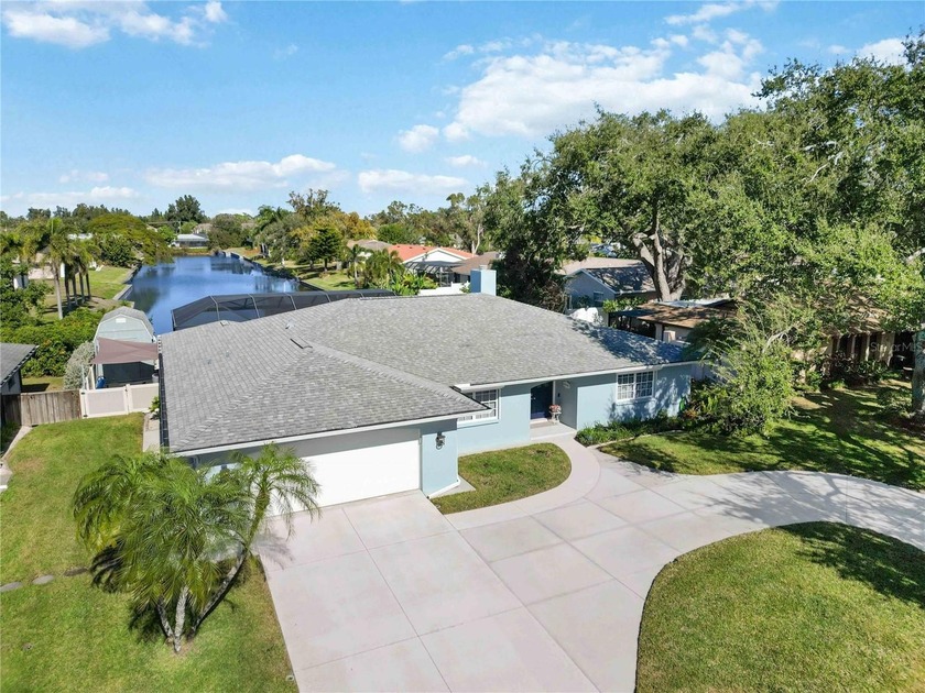 Don't miss this beautifully updated pool home showcasing one of - Beach Home for sale in Sarasota, Florida on Beachhouse.com