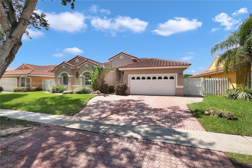 Absolutely gorgeous one-story home! This 4-bedroom, 2.5-bath - Beach Home for sale in Miramar, Florida on Beachhouse.com