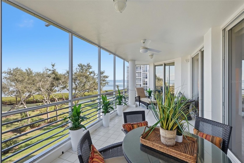 Set within a living canopy of mangroves and coastal trees, this - Beach Condo for sale in Longboat Key, Florida on Beachhouse.com